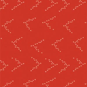 May include: A red background with a repeating pattern of white triangles forming arrow shapes.