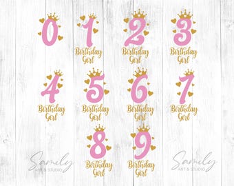 May include: Pink numbers 0-9 with gold crowns and hearts, each labeled "Birthday Girl." The numbers are in a playful font, perfect for birthday decorations. The background is a white wood grain.