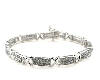 Bracelet tennis en or blanc 10 carats et diamants deux rangs en X