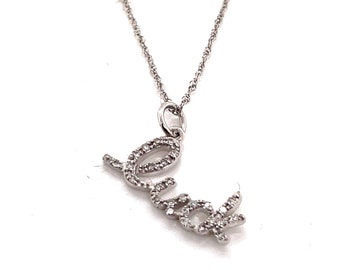 10Kt White Gold .06CT Diamond Luck Hanging Pendant