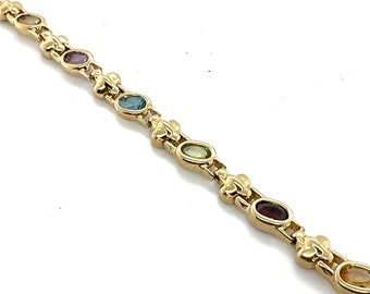 Bracelet serti de pierres précieuses multicolores en or jaune 14 carats