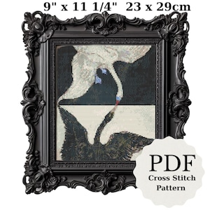 May include: Black framed cross stitch pattern featuring two swans, one white and one black, with the text "PDF Cross Stitch Pattern" in the lower right corner. The pattern measures 9 inches by 11 1/4 inches.