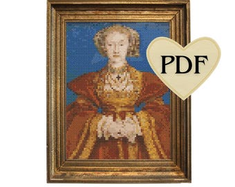 May include: A framed cross-stitch portrait of a woman in a gold and red gown, set against a blue background. The portrait is in a gold-colored frame. A heart-shaped tag with the letters "PDF" is in the upper right corner.