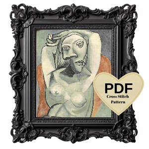 May include: A cross stitch pattern PDF for a portrait of a woman in a cubist style. The woman is nude and has her arm raised above her head. The background is a blue and orange color.