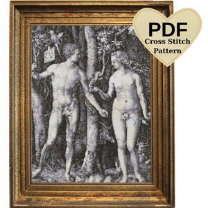 May include: A framed cross-stitch pattern showing a black and white image of Adam and Eve in a garden. The frame is gold-coloured. A heart-shaped tag in the top right corner reads "PDF Cross Stitch Pattern."