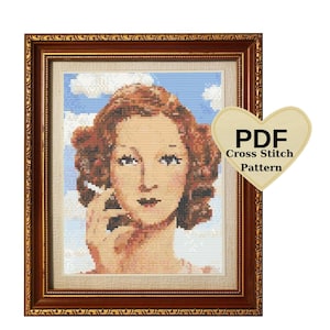 May include: Cross-stitch portrait of a woman with red hair, framed in a decorative brown frame. The woman is holding a cigarette. The background is a blue sky with white clouds. A heart-shaped tag reads "PDF Cross Stitch Pattern."