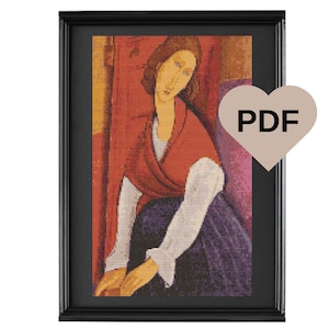May include: Framed cross-stitch art featuring a portrait of a woman in a red shawl and purple dress. The artwork is in a black frame and includes a heart-shaped graphic with the text "PDF". The color palette includes red, purple, and beige.