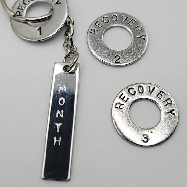 Sobriety ring with coins for each milestone Hand Stamped stainless steel washer www.KnabCustomDesigns.com