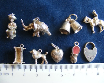 F) Vintage Sterling Silver Charms Mexican Drummer, Elephant, Jocky, Baby Crib, Enamelled baby bootie