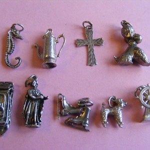 Srebrny wisiorek w stylu vintage: konik morski, dzbanek do kawy, krzyż, parowiec (K)