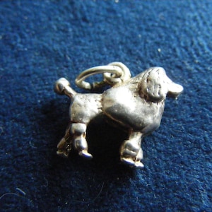 A) Vintage Sterling Silver Charm  Swiss Cow, Poodle