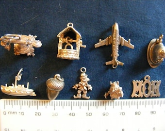 I)  Vintage Sterling Silver Charms Nuvo Telephone, Wishing well, Airplane opens, Police Helmet opens, Life Boat, Clown, Viking, MOM