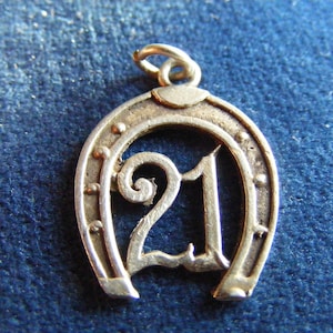 C) Vintage Sterling Silver Charm 21 in a horseshoe