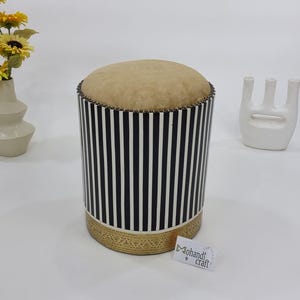 Carved Resin & Brass Wood Chair in Black and White, featuring a traditional Moroccan touch and soft fabric for exceptional comfort.