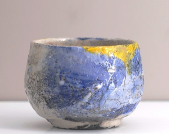 Chawan 9 / Hand carved raku tea bowl.