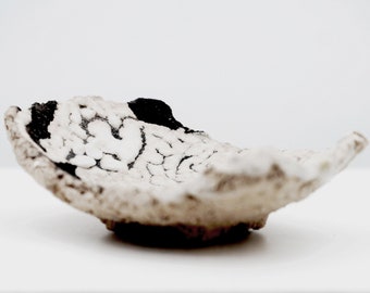 Raku 4 cup, hand carved cup, ceramic, white and black colors.