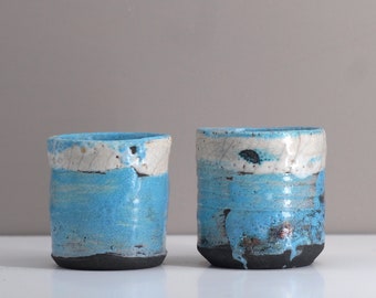 Yunomi 14 / Set of two small handmade raku tea bowls.