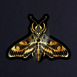 Sticker Sphinx Tête de Mort Doré Holographique - Symboles Ésotériques et Lune - Art Gothique en Vinyle