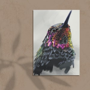 May include: A close-up of a hummingbird with iridescent green, pink, and orange feathers. The bird's head is tilted up, and its eye is visible. The background is a soft white.