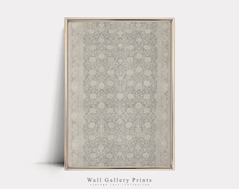 May include: A framed print of a vintage rug with a light grey background and a white floral pattern. The frame is gold and the print has the text "Wall Gallery Prints" and "vintage | art | collection" at the bottom.