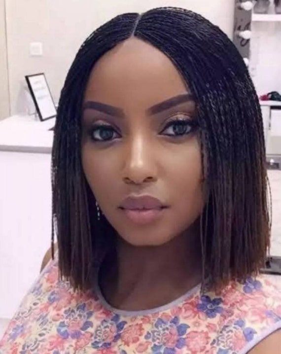Image of Blunt cut bob with braids on natural hair