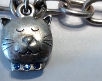 Vintage Silver Tone Charm Bracelet with Cat, Bell, Fish bones, ball of yarn, and Cool Cat.  Toggle clasp