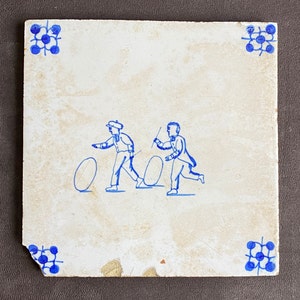 ANTQ Delft Tile Hand-painted Blue on White of Boys Rolling Hoop/Spider Corners (chip) Tin Glazed Earthenware 19th Century Dutch Netherlands