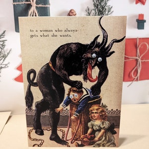 Para una mujer que siempre consigue lo que quiere. (Con amor, Krampus) Tarjeta de felicitación navideña con ojos saltones