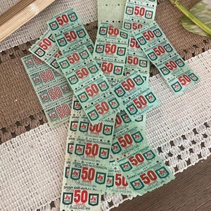 75 znaczków Vintage S H Saver (nieużywanych) w kolorze zielonym o nominale „50”.