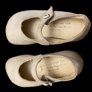 Vintage Pair of White Childs Shoes made in England for Montreal, well loved!