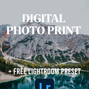 May include: Digital photo print of a mountain lake with a reflection of the mountains in the water. The text "DIGITAL PHOTO PRINT + FREE LIGHTROOM PRESET" is at the top of the image. The Lightroom logo is at the bottom of the image.