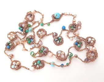 "Flowers and Colors" Necklace, a long crochet necklace with small flowers.