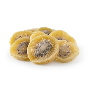 May include: A pile of dried kiwi fruit slices. The slices are a light yellow color and have a brown center. The kiwi slices are arranged in a circle.
