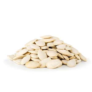 May include: A pile of white pumpkin seeds, a popular snack and ingredient for baking.