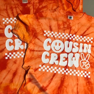Orange Tie Dye Cousin Crew Shirt: Checkered Smile Face Tees