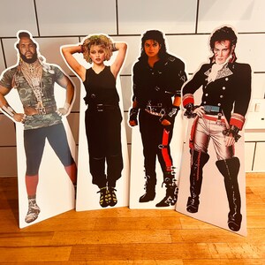 80s Party Table Decorations Mini 80s Star Cutouts Pack of Four 42.5cm tall