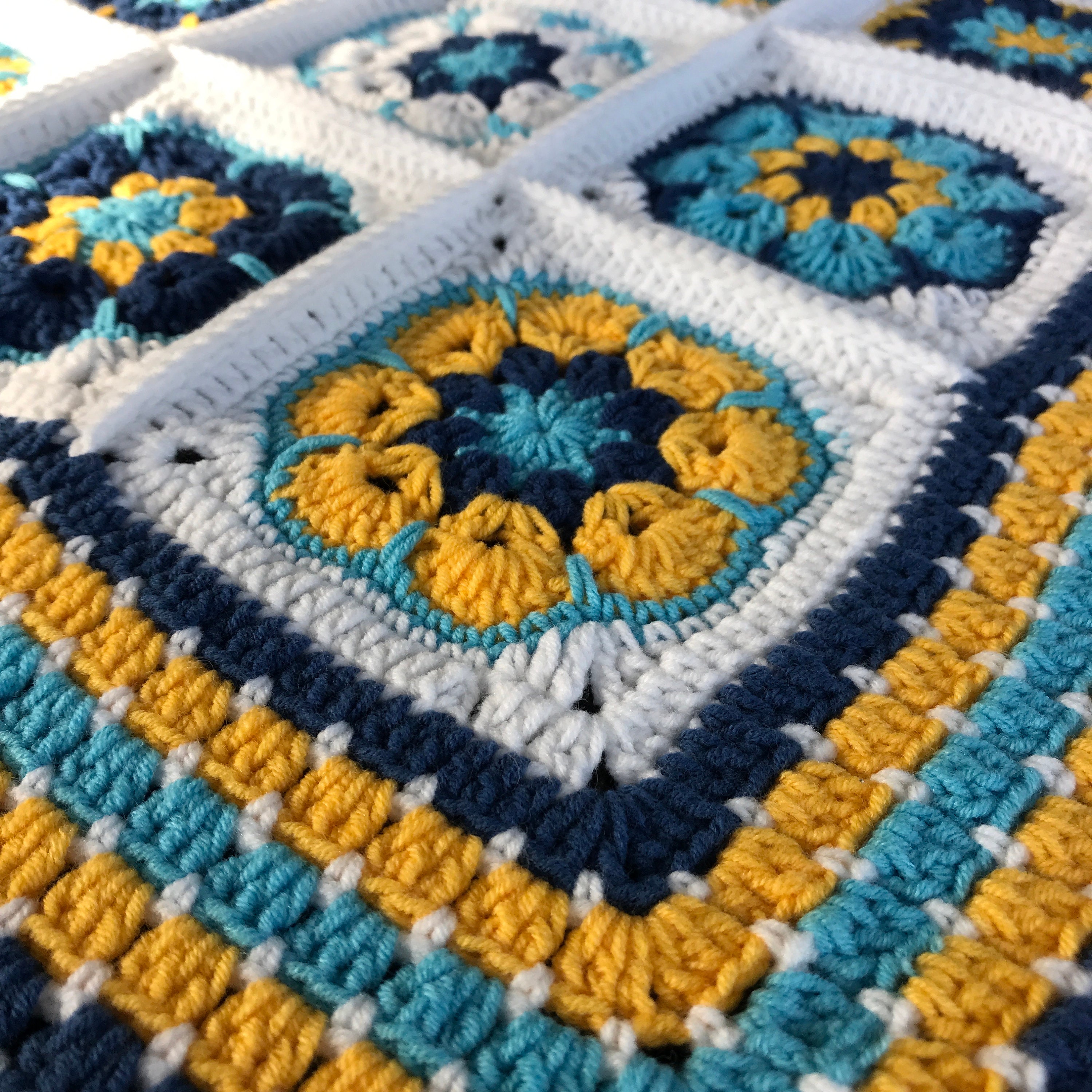 Wide Bordered African Floral Crochet Blanket With Light Blue Colors