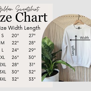 May include: A size chart for Gildan sweatshirts, showing the width and length measurements in inches for sizes S through 4XL.