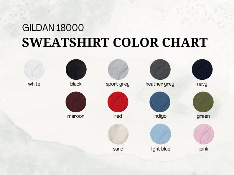 May include: Color chart for Gildan 18000 sweatshirts, showing 12 different colors: white, black, sport grey, heather grey, navy, maroon, red, indigo, green, sand, light blue, and pink.