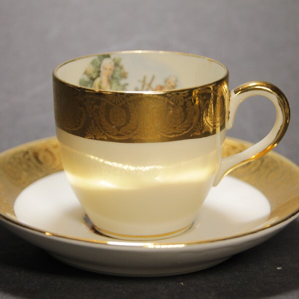 22 Karat Gold Warranted - Cup and saucer