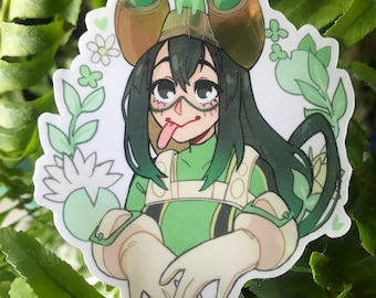 May include: A green and white anime character with green hair and a frog on her hat. The character is wearing a green and white jumpsuit and has a green tongue sticking out. The background is white with green leaves and flowers.