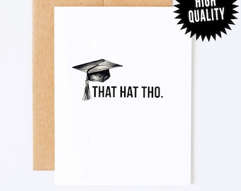 May include: A white card with a black graduation cap and the text "THAT HAT THO." The card is on a brown envelope.