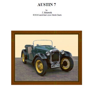 May include: A cross stitch pattern of a green Austin 7 car with a yellow license plate that reads "MNATHO". The car is in a brown frame.