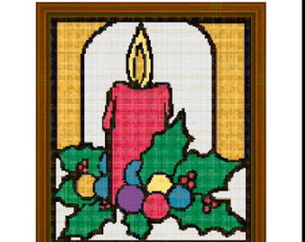May include: A cross stitch pattern for a Christmas candle featuring a red candle, green holly leaves, and colourful baubles. The pattern is framed in a brown frame with a yellow and gold background.