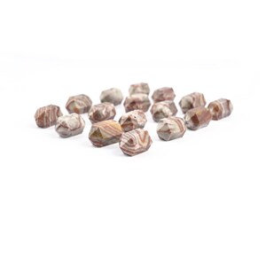 May include: A collection of faceted, natural stone beads. The beads display a mix of colours, including shades of brown, tan, and cream, with unique striped patterns. These gemstone beads are ideal for jewellery making and crafting projects.