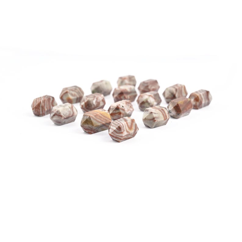 May include: A collection of faceted, natural stone beads. The beads display a mix of colours, including shades of brown, tan, and cream, with unique striped patterns. These gemstone beads are ideal for jewellery making and crafting projects.