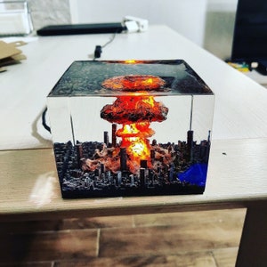 resin diorama, atomic bomb, resin sculpture, epoxy resin art, small lamp, miniature diorama