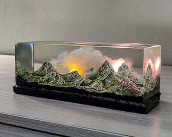 Resin diorama, miniature landscape, sunset mountain, hand-sculpted, romantic sunrise, ornament