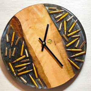 resin and wood wall clock, bullets