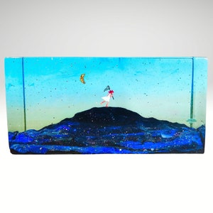 resin diorama, miniature landscape, moon, stars and little girl, resin art, resin sculpture